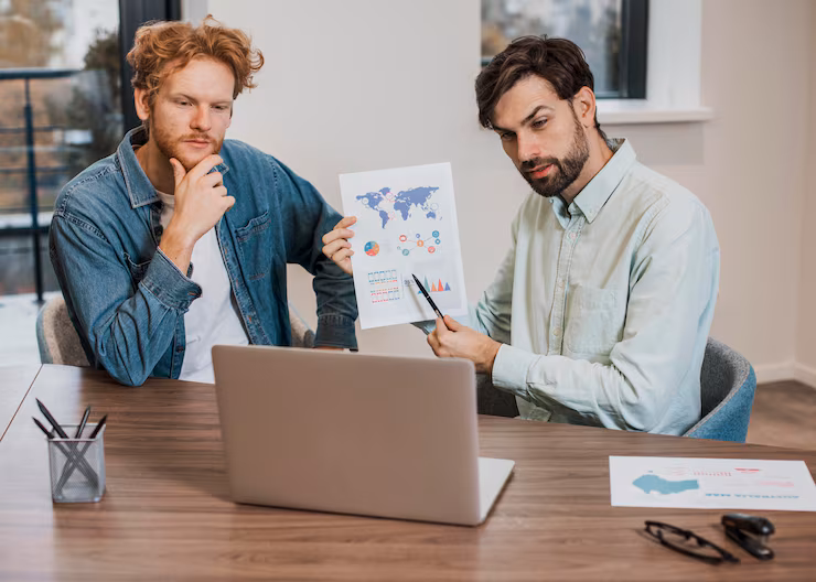 job-colleagues-working-laptop_23-2148761294